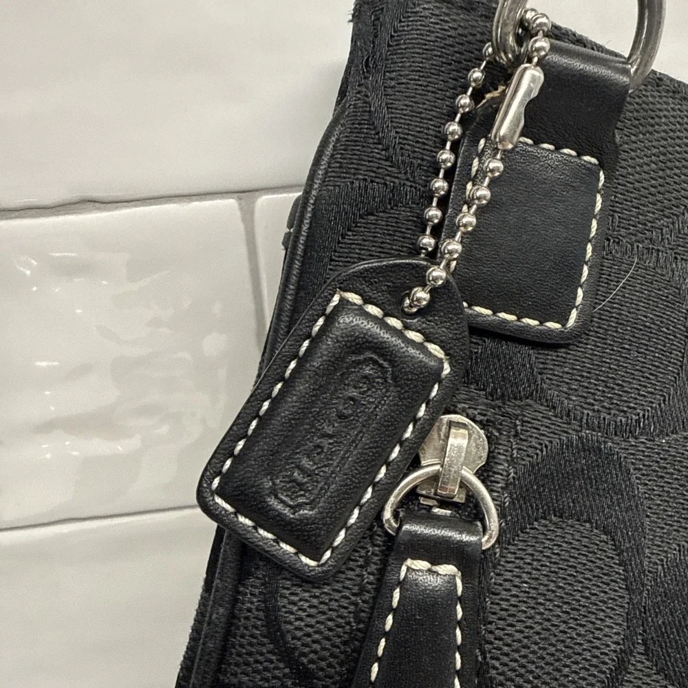 Coach Black Signature Crossbody Bag Silver Zip Closure Adjustable Strap Phone